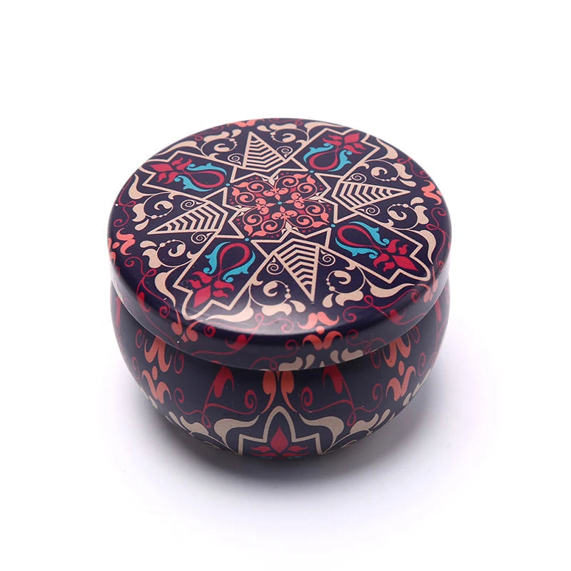 Decorative round container with intricate patterns on a white background