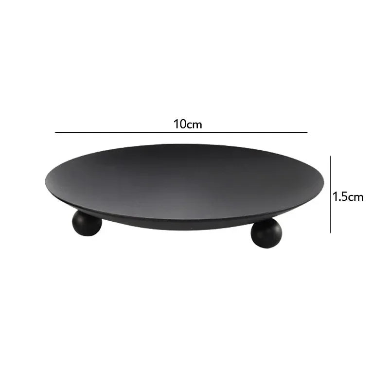 Black round stand with dimensions: Diameter 10cm, Height 1.5cm