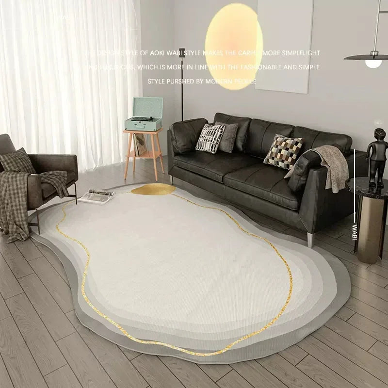 Round stone-gray rug with gold trim in a living room setting
