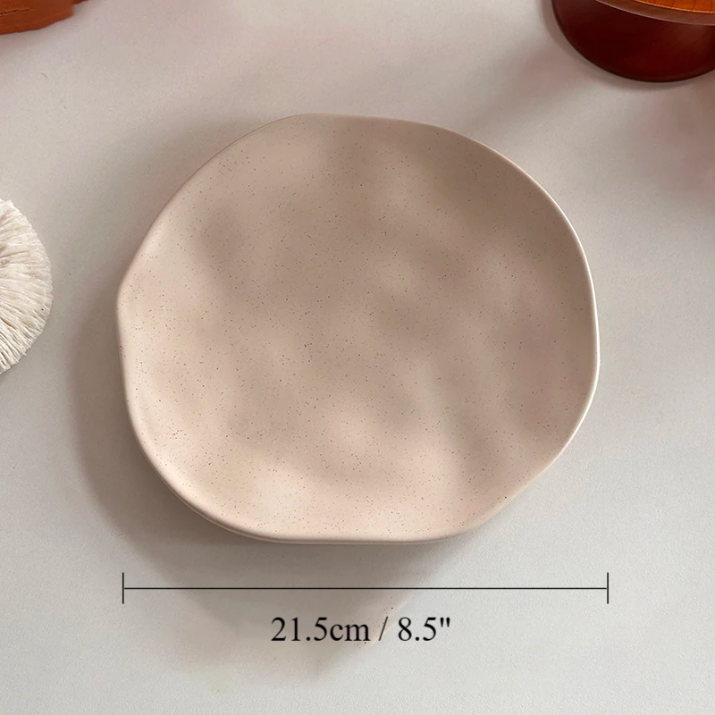 Beige ceramic plate on a light background with dimensions: Diameter 21.5cm