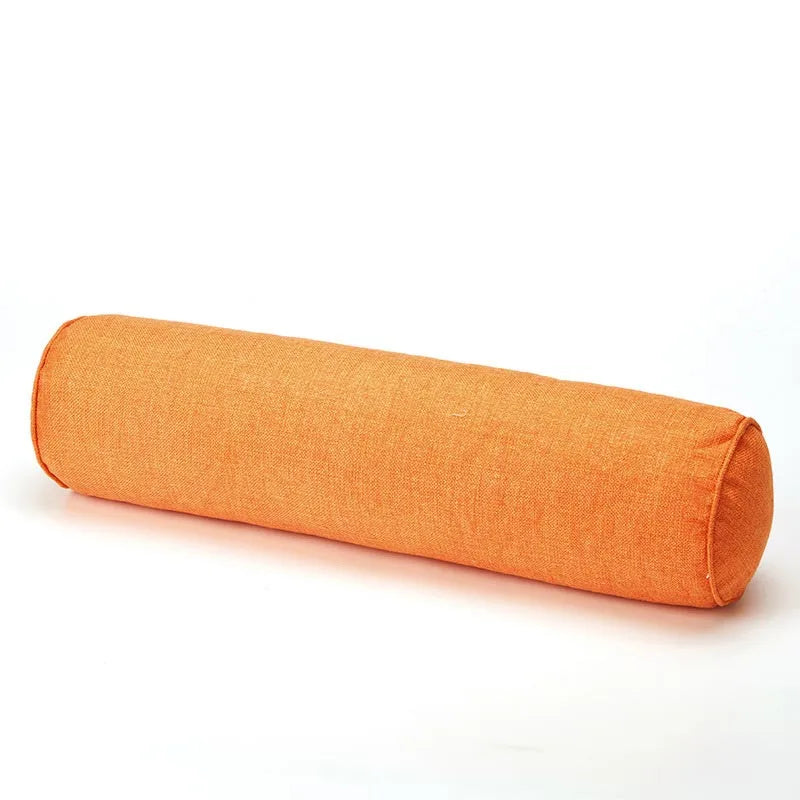 Orange cylindrical pillow on a white background