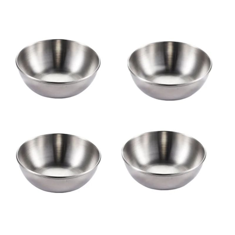 Four stainless steel bowls on a white background