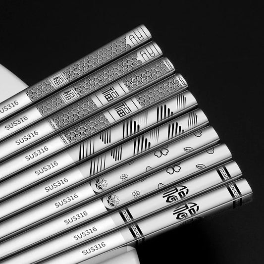 Metal rods with engraved patterns and 'SUS316' marking on a black background