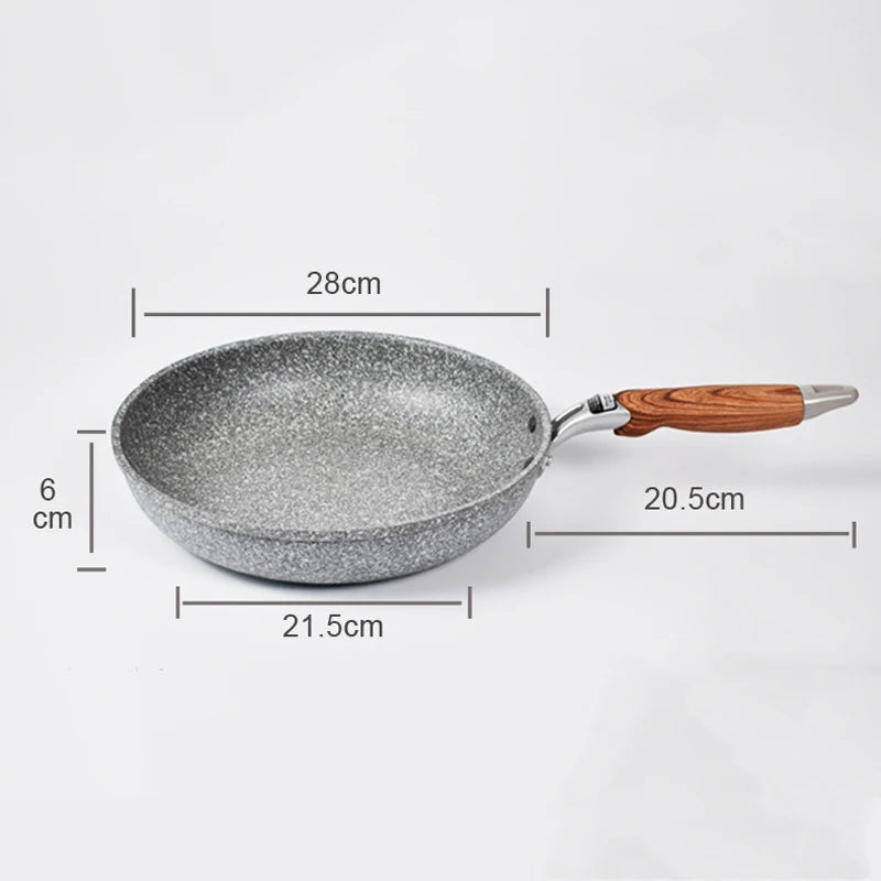 Gray speckled frying pan with wooden handle (20.5cm) and stone bowl (21.5x28cm, 6cm height) on a white background