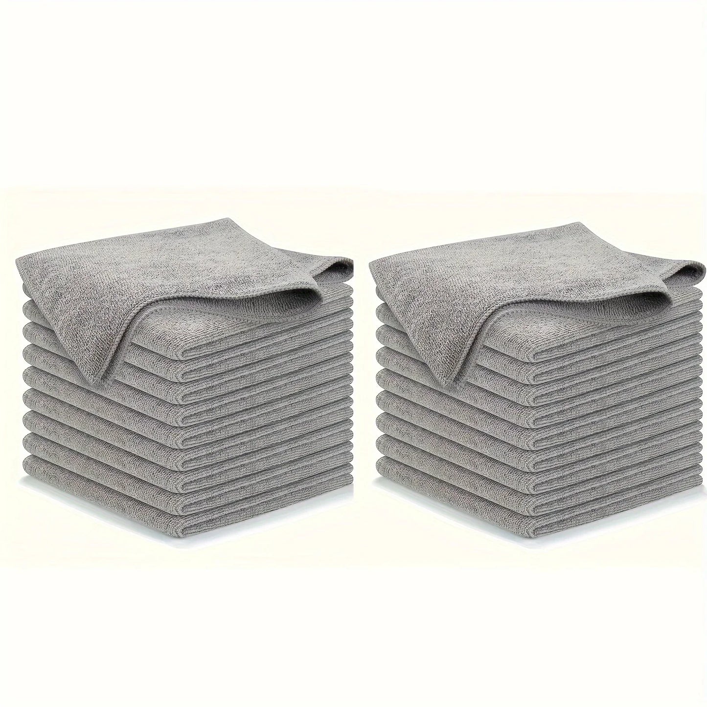 Two stacks of 10 gray towels on a white background