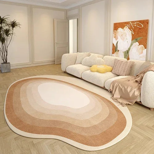 Living room with a beige sofa, round rug, and decorative elements.