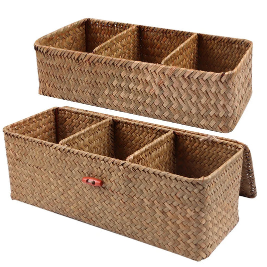 Two woven storage baskets with compartments on a white background