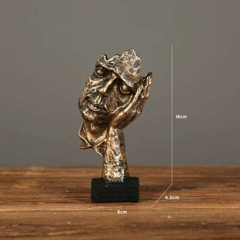 Bronze sculpture of a man with its hand supporting its face in a boredom gesture on a gray background, measurements: 8cm x 16cm x 4.5cm 