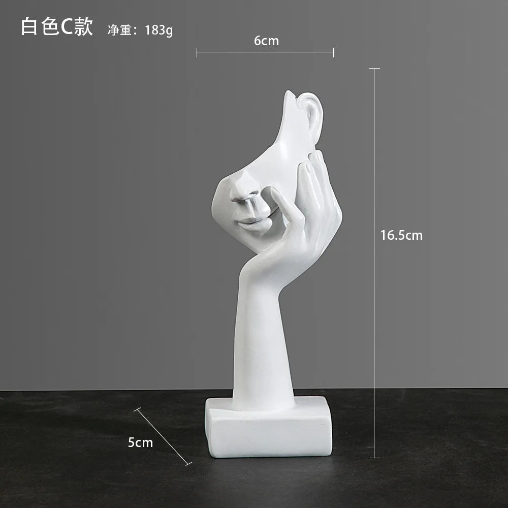 White sculpture of a hand holding a chin with dimensions: 5cm x 16.5cm x 6cm