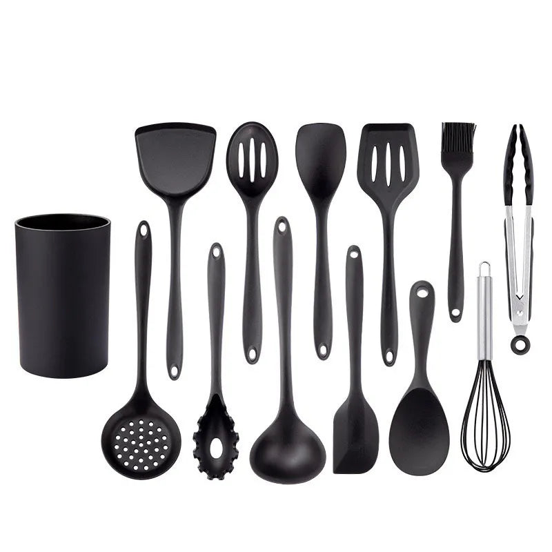 Set of black kitchen utensils including spatulas, spoons, and a whisk on a white background