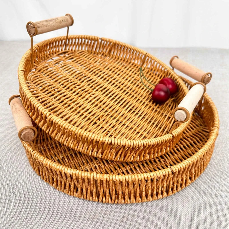Wicker tray with handles on a light gray surface