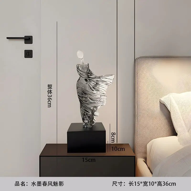 Decorative sculpture on a pedestal with dimensions: Height 36cm, 10cm x 15cm base