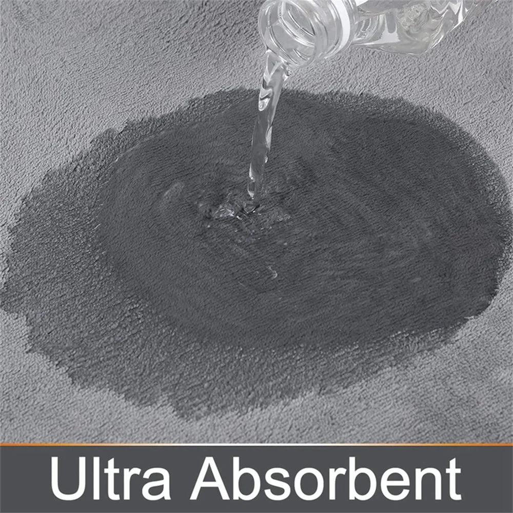 Ultra absorbent material absorbing water on a gray background with 'Ultra Absorbent' text at the bottom.