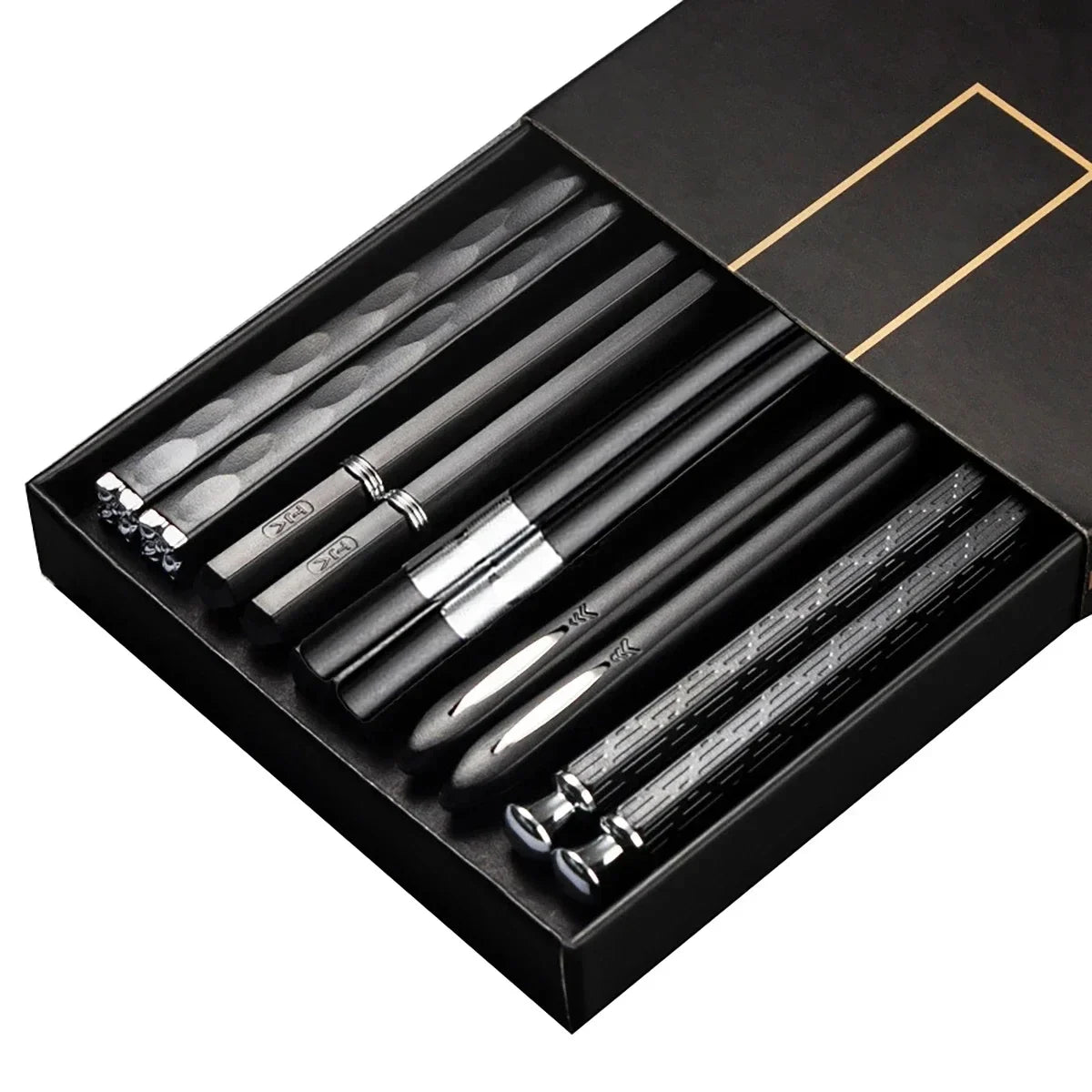 Set of black pens with silver accents in a black box