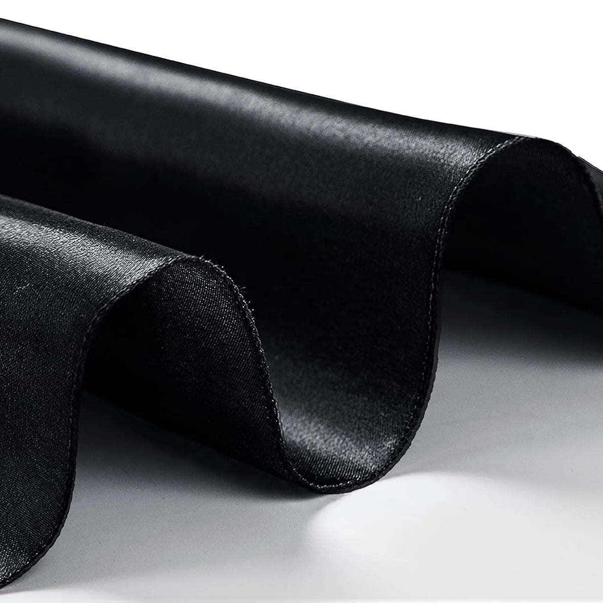 Close-up of black fabric with a focus on texture and color.
