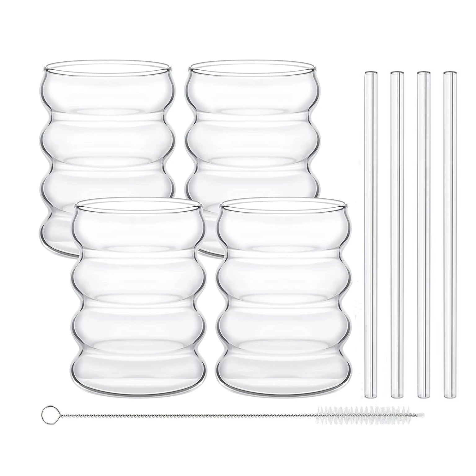 Set of clear glass tumblers with wave-like design and four straws on a white background