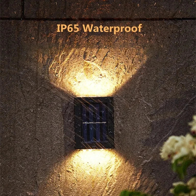Wall-mounted outdoor light fixture on a textured wall with 'IP65 Waterproof' text.