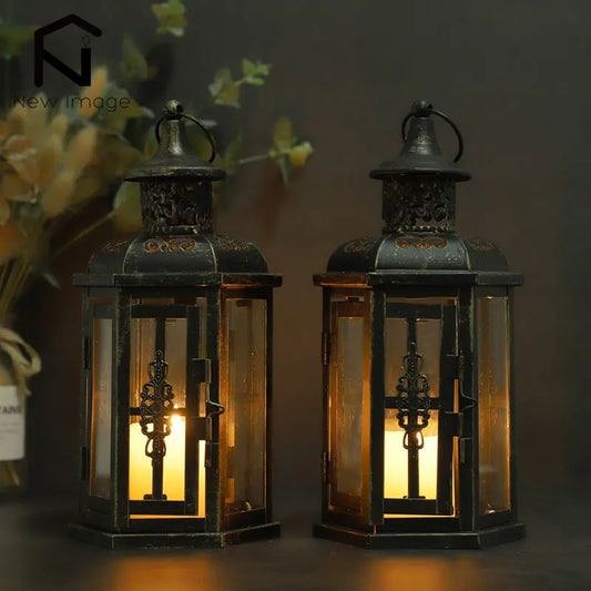 Two illuminated lanterns with intricate designs on a dark background