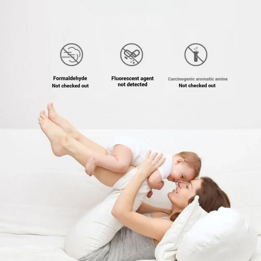 Woman lying on a bed with a baby, surrounded by text indicating: no formaldehyde, no fluorescent agents, no carcinogenic aromatic amine