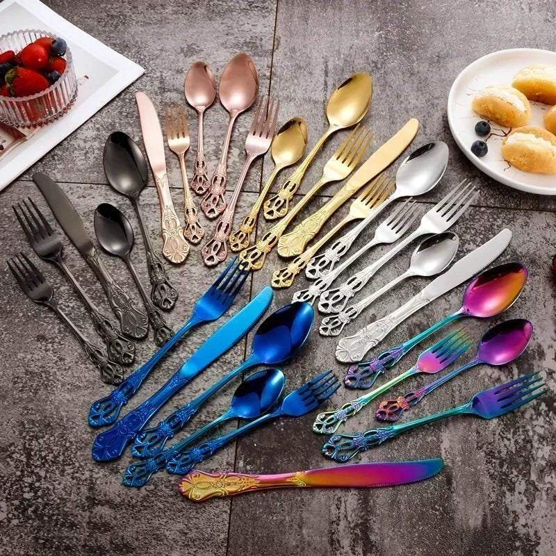 Colorful cutlery set on a textured surface