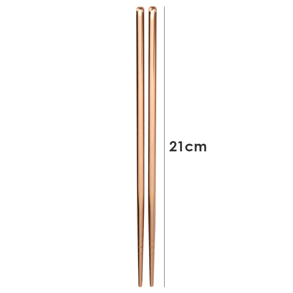 Pair of rose gold chopsticks with measurement: 21cm