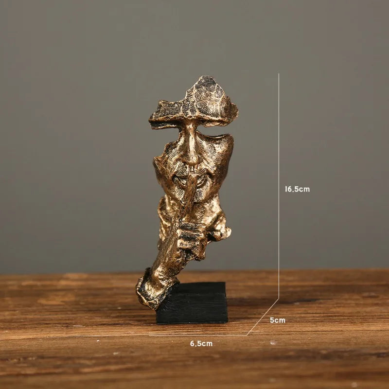 Bronze sculpture with a finger raised in a "shushing" gesture on a gray background, measurements: 6.5 x 16cm x 5cm 